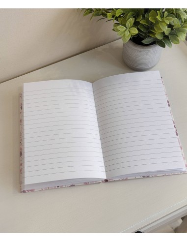 Libreta flores con bolígrafo dorado...