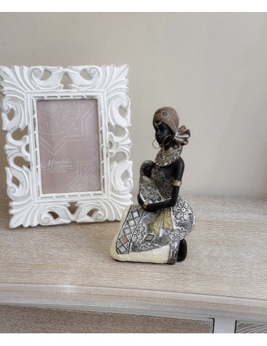 Figura decorativa africana con bebé...