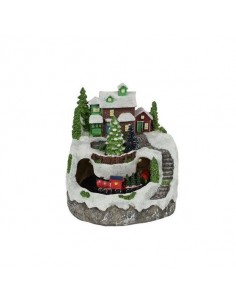 Pueblo navideño con luces y...