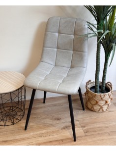 Silla tapizada efecto cuero...